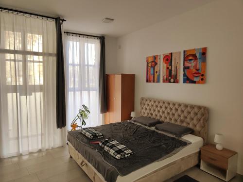 Apartman Opačić 1 Sombor – udoban apartman sa rustičnim detaljima i prijatnim ambijentom pogodnim za porodični boravak.